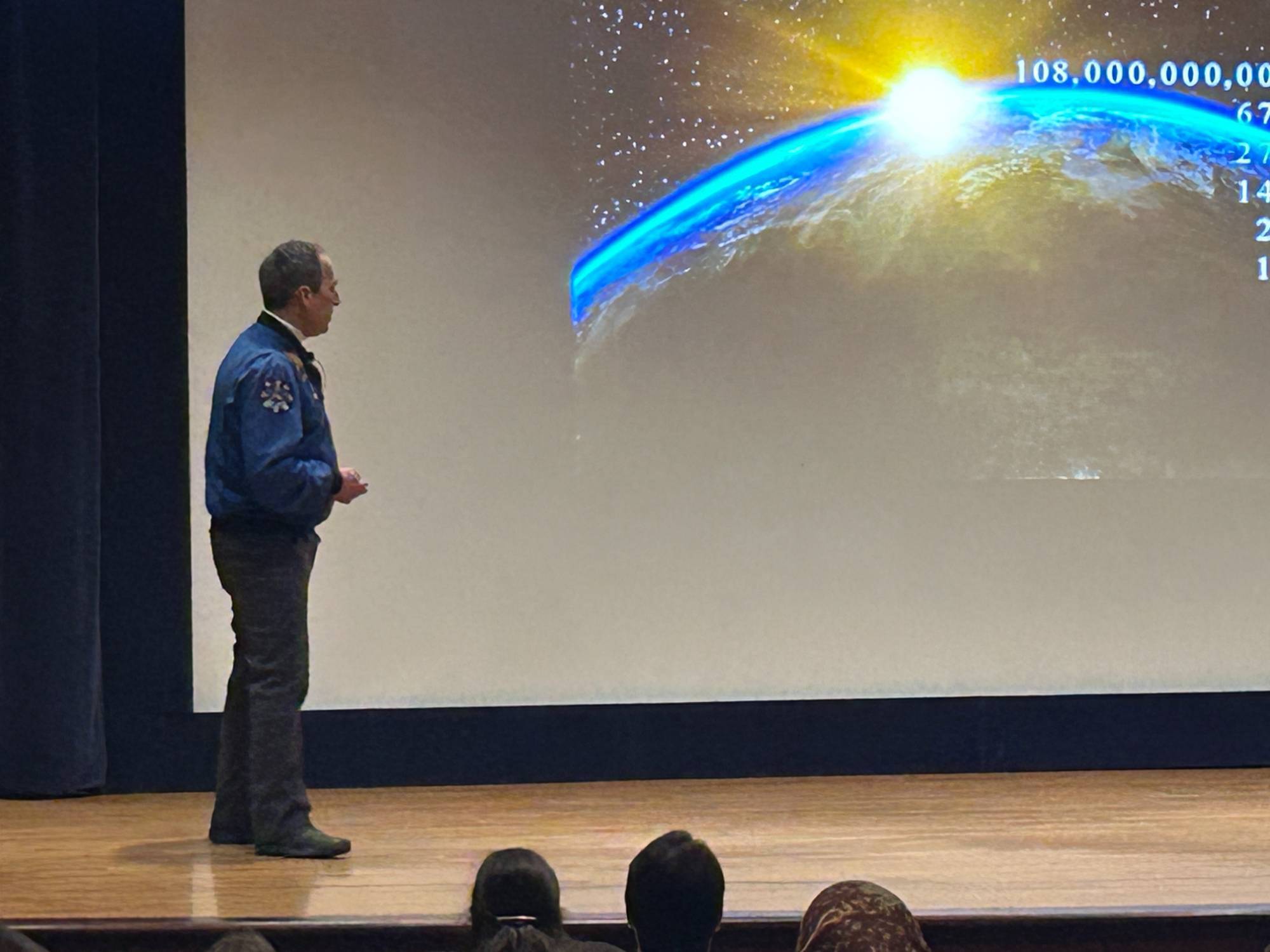 John B. Herrington addresses the audience